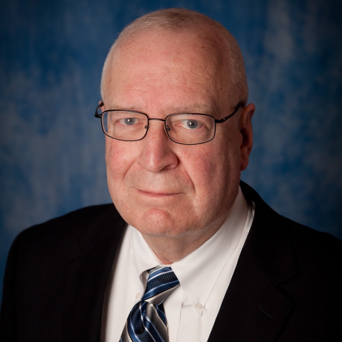 Headshot of James Grennen